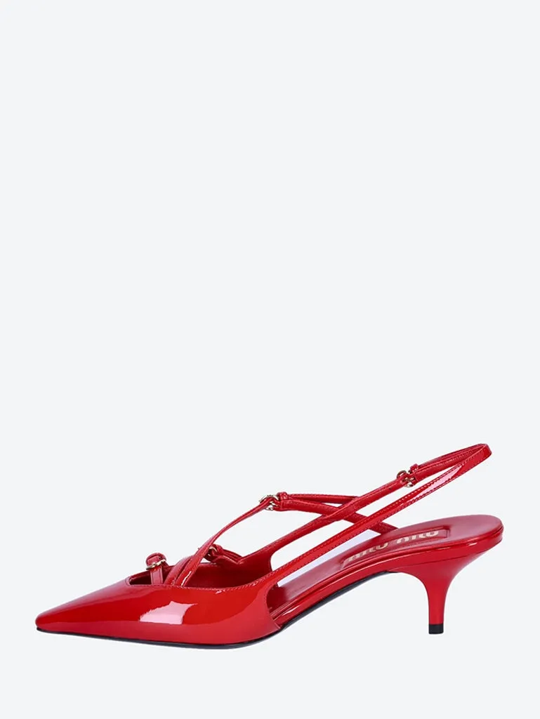 Open heel patent leather pumps