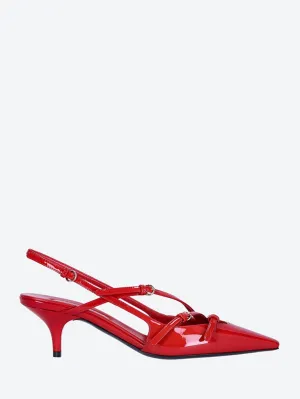 Open heel patent leather pumps